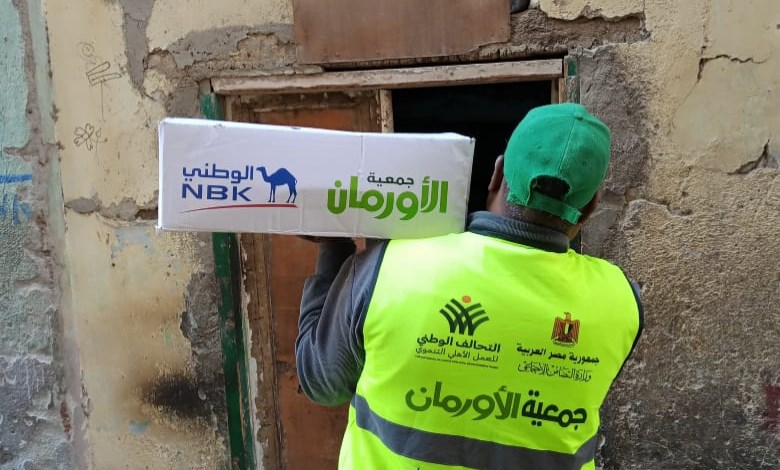 توزيع كراتين للأسر المستحقة